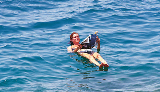 Floating in the Dead Sea on a holiday in Jordan