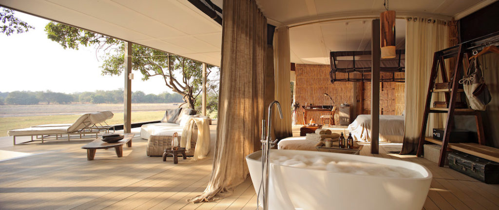 Chinzombo is situated on the sweeping curve of the Luangwa River in the animal-rich area of South Luangwa National Park. With the river in front of the lodge and the bush behind, the location offers the perfect spot for safari. The luxurious camp retains its bush authenticity with grass and canvas walls and spacious living areas. Chinzombo offers 6 villas, one of which is a 2-bedroom villa perfect for families or small groups. Each villa has its own private pool, cooled sleeping area, and spacious bathroom. 