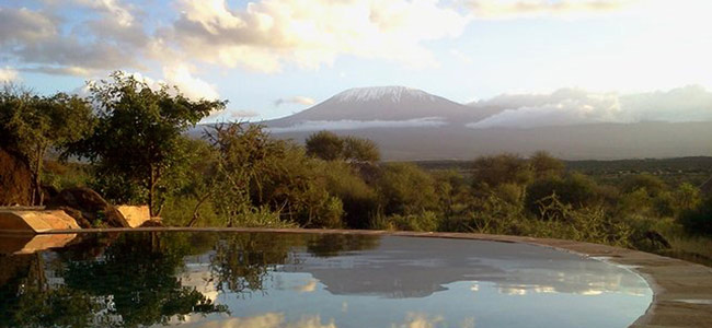 Amboseli belongs in the elite of Kenya's national parks. Home to some of the largest elephant populations in East Africa, it a photographers dream, with snow-capped Kilimanjaro, the highest free-standing mountain in the world, forming the jaw-dropping backdrop to your safari. Positioned in a quiet, unspoilt, unique setting on a 4,000 hectare Private Conservation Area at the foot of Mount Kilimanjaro, Satao Elerai Camp looks down onto Amboseli National Park, giving clients what is arguably the best location of any camp in Amboseli.